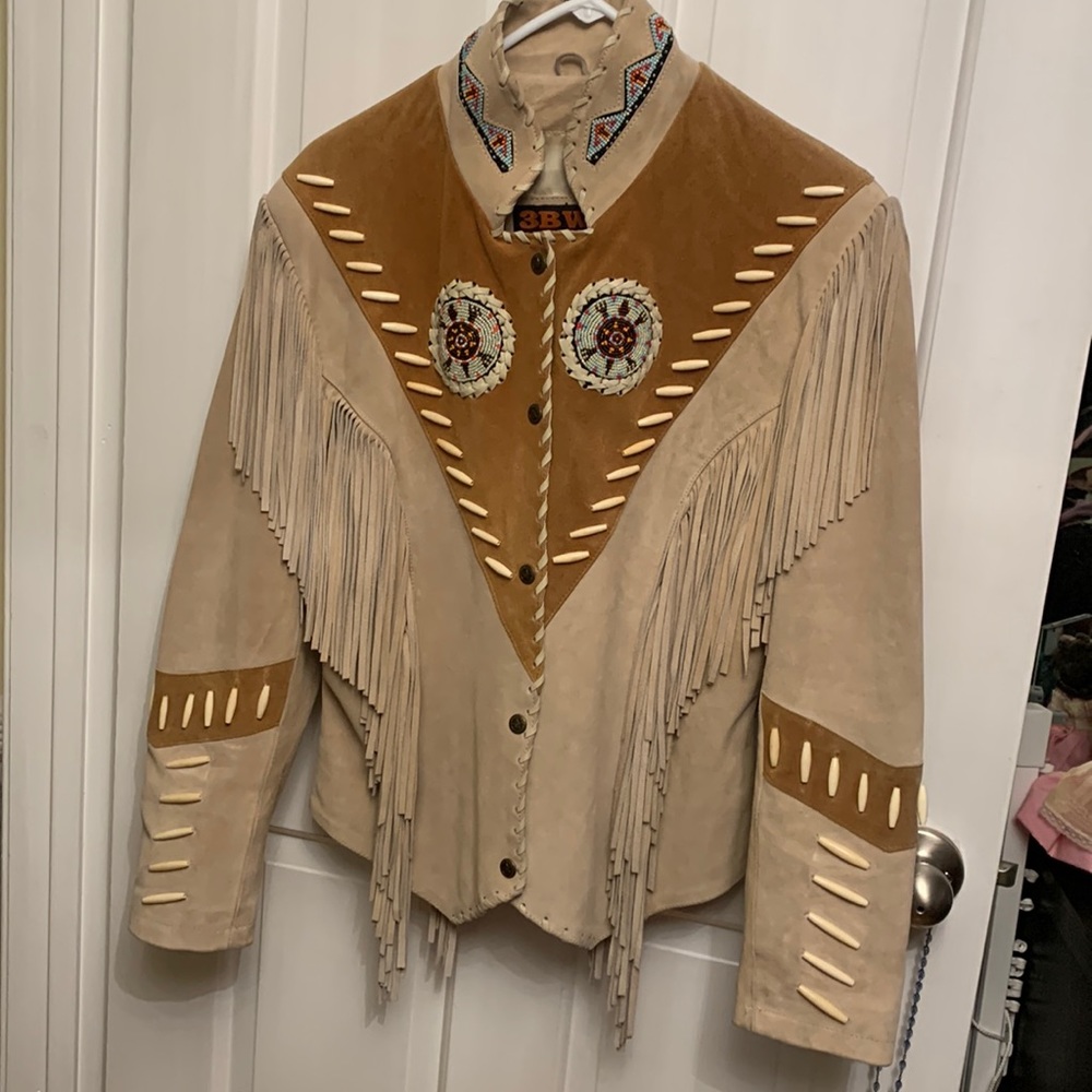 Suede fringe Jacket worn a few times. This jacket is heavy, in great condition